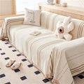 Seduta imbottita con ante rivestimento in tessuto beige